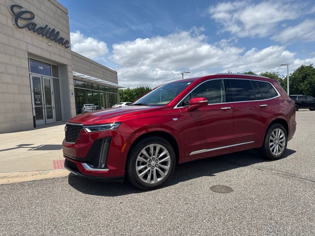 Used 2024 Red Cadillac Premium Luxury image 1
