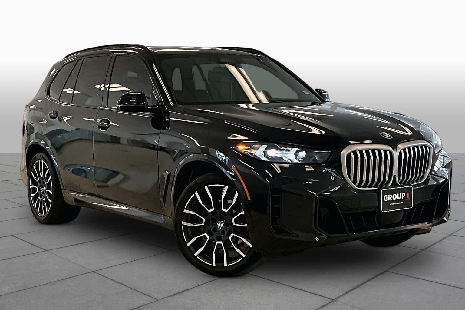 Used 2024 Black Sapphire Metallic BMW sDrive40i image 2