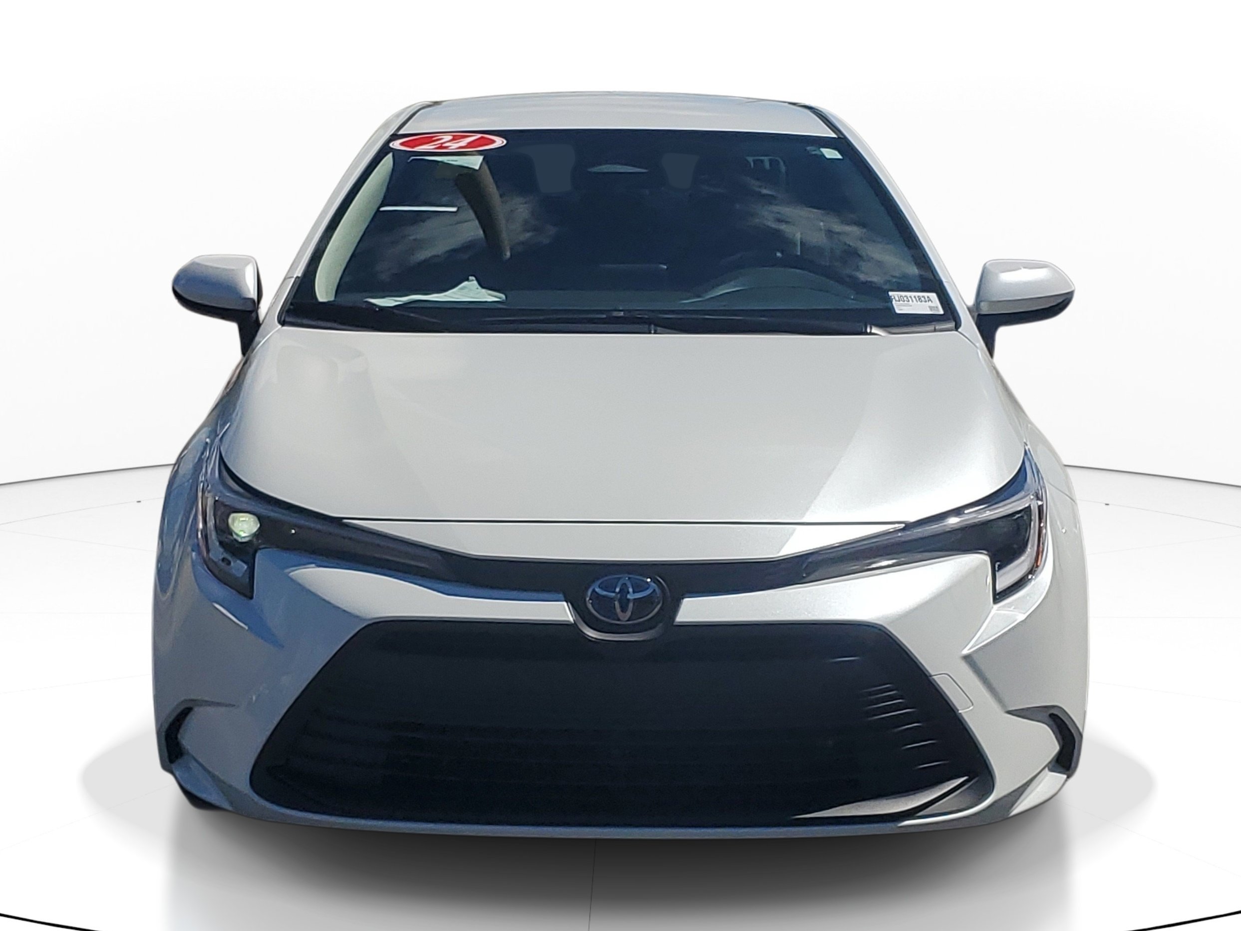 Used 2024 Wind Chill Pearl Toyota Hybrid LE image 1