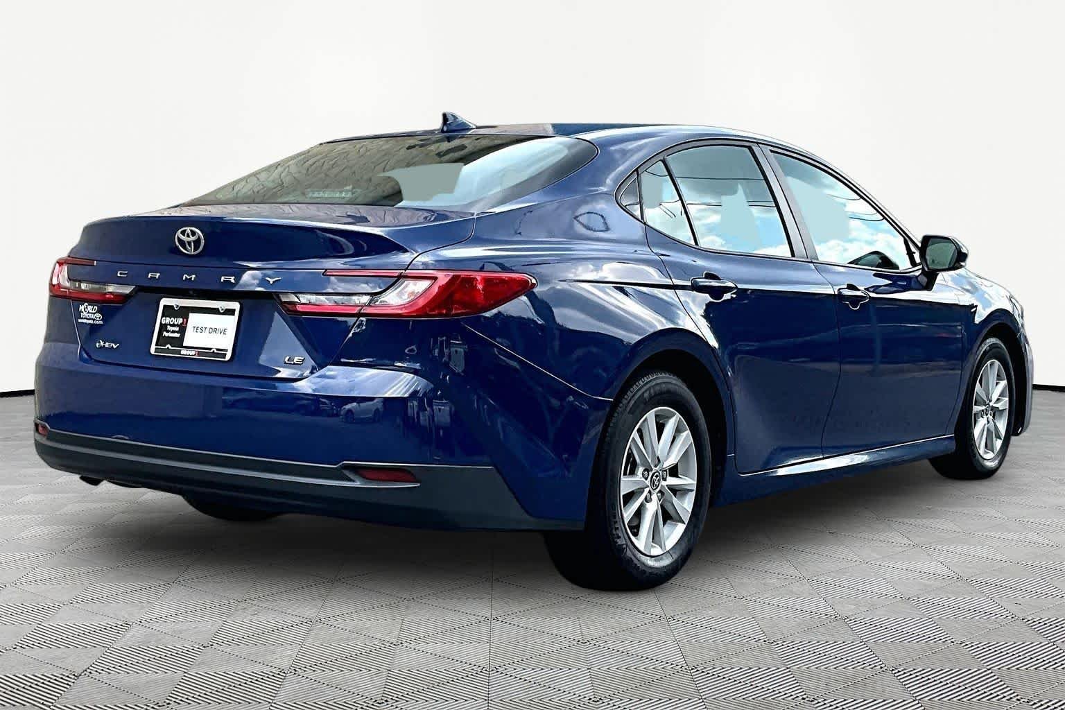 Used 2025 Reservoir Blue Toyota LE image 13