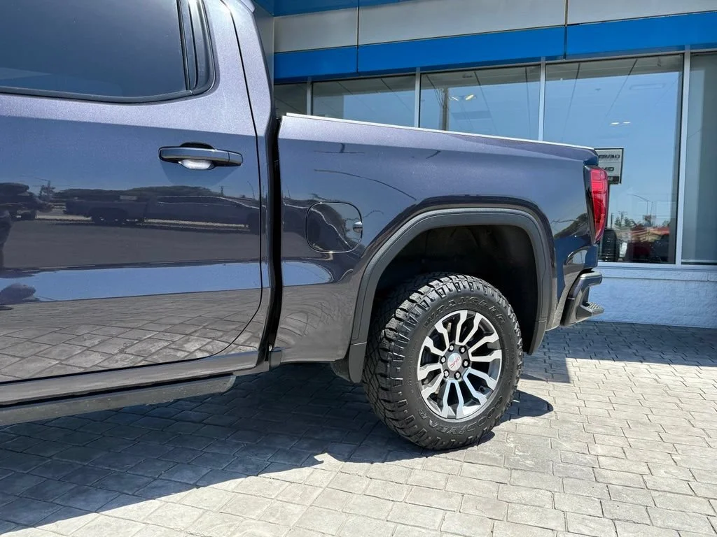 Used 2023 Titanium Rush Metallic GMC AT4 image 6