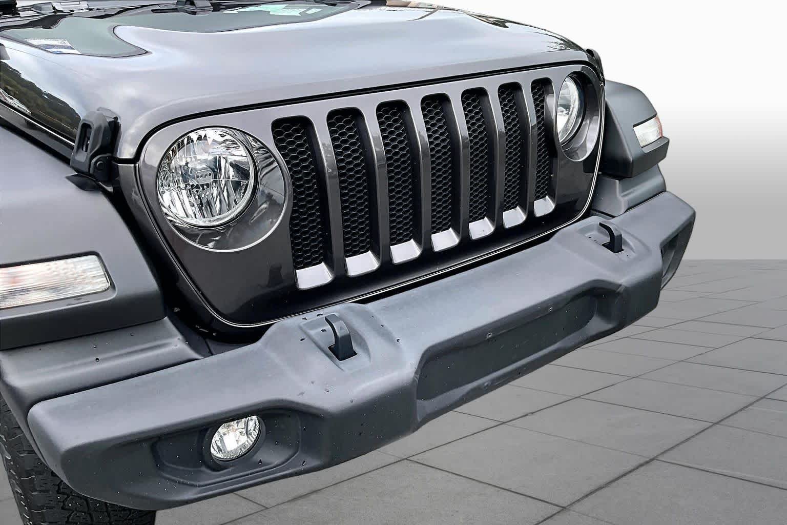Used 2021 Granite Crystal Metallic Clearcoat Jeep Unlimited Sport S image 28