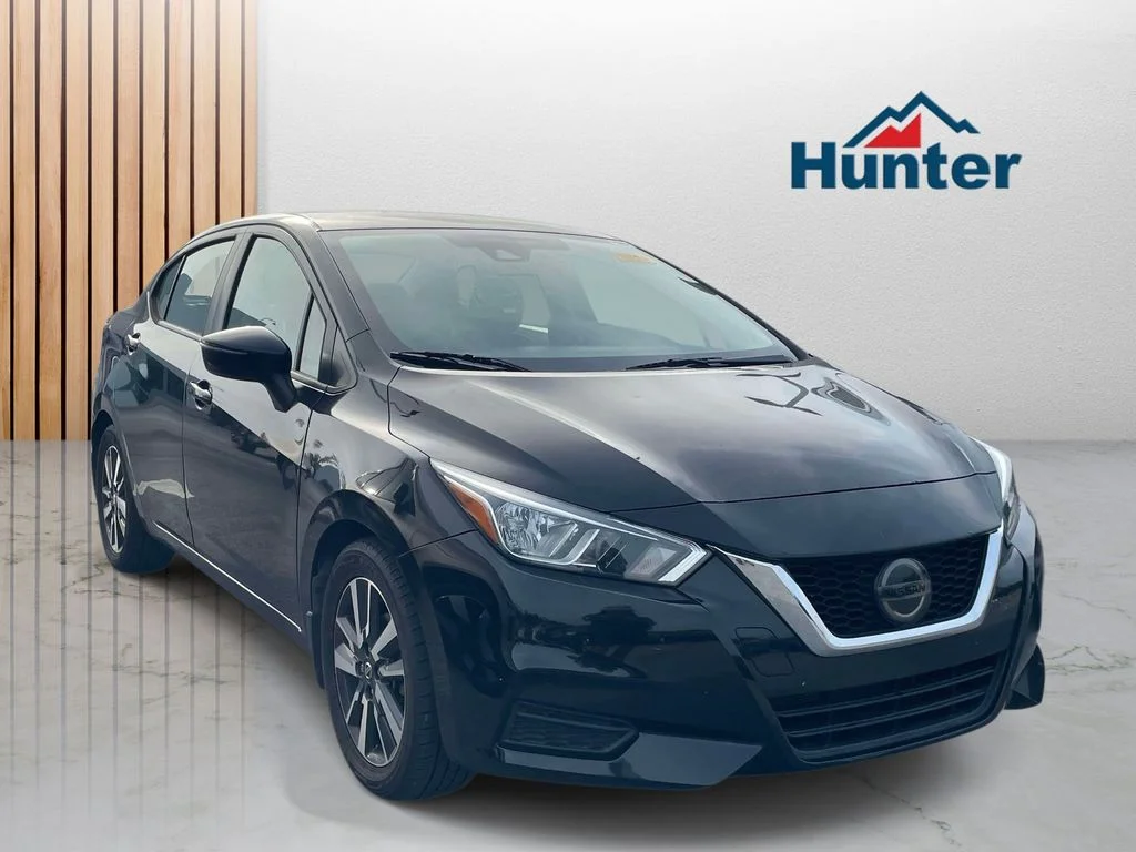 Used 2020 Super Black Nissan SV image 1