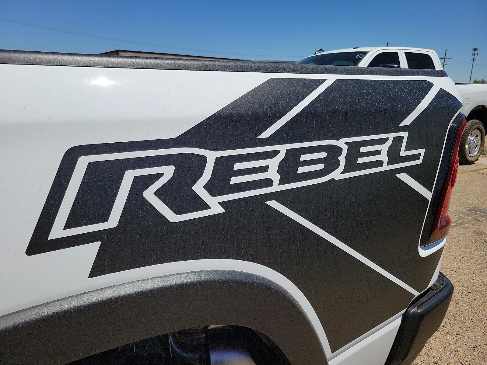 New 2026 PW7 Bright Whit Ram REBEL CREW CAB 4X4 5