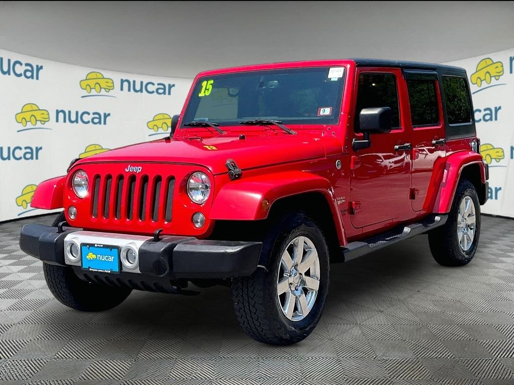 Used 2015 Red Jeep Unlimited Sahara image 3