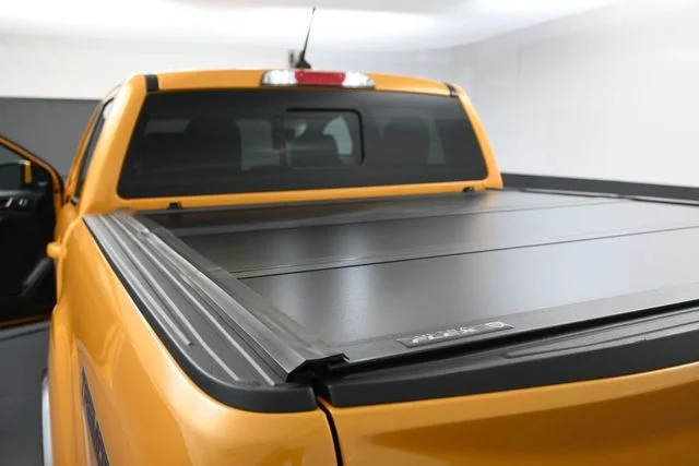 Used 2021 Orange Ford Lariat image 13