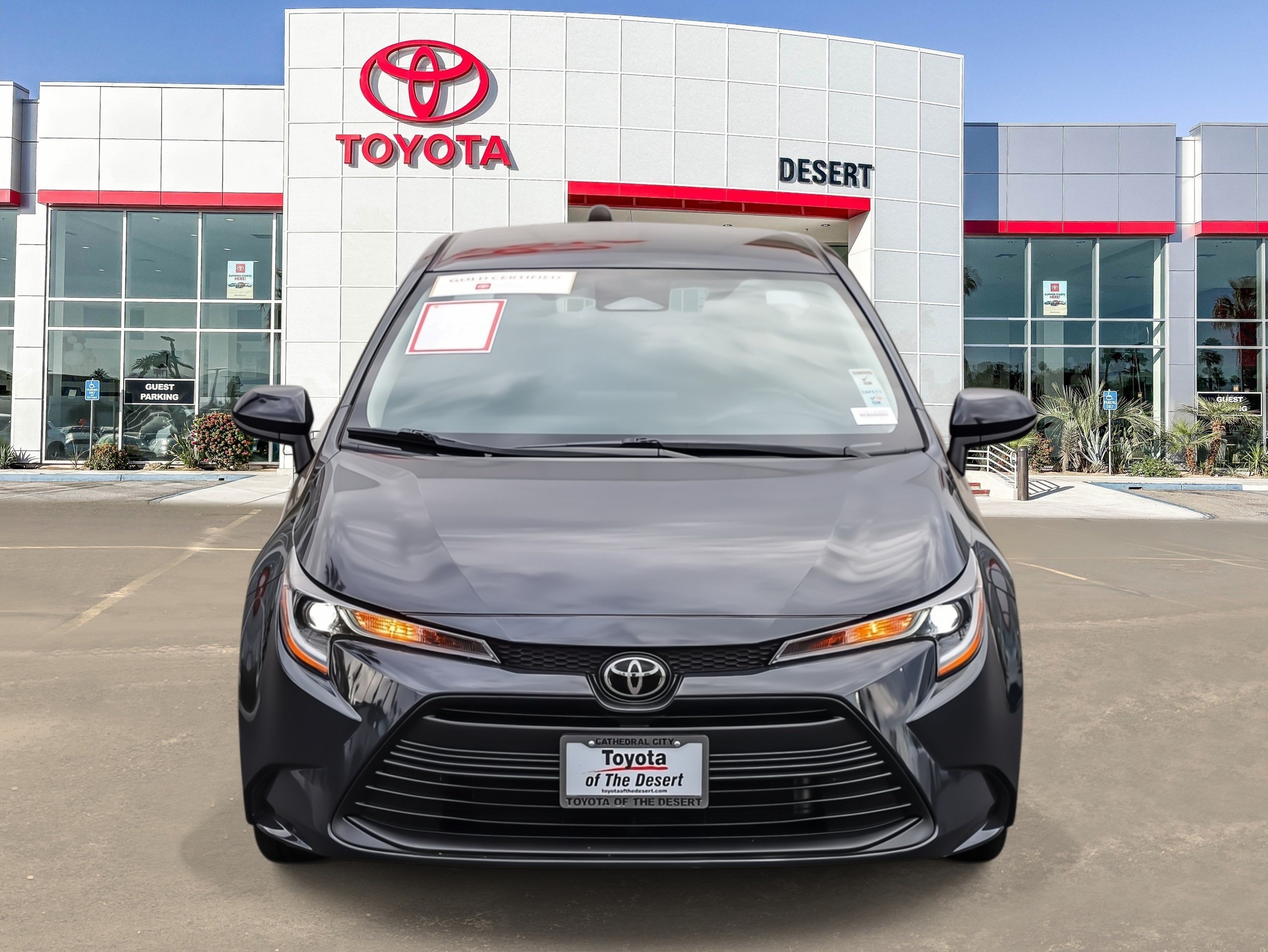 Used 2024 Underground/Midnight Black Metallic Toyota LE image 2