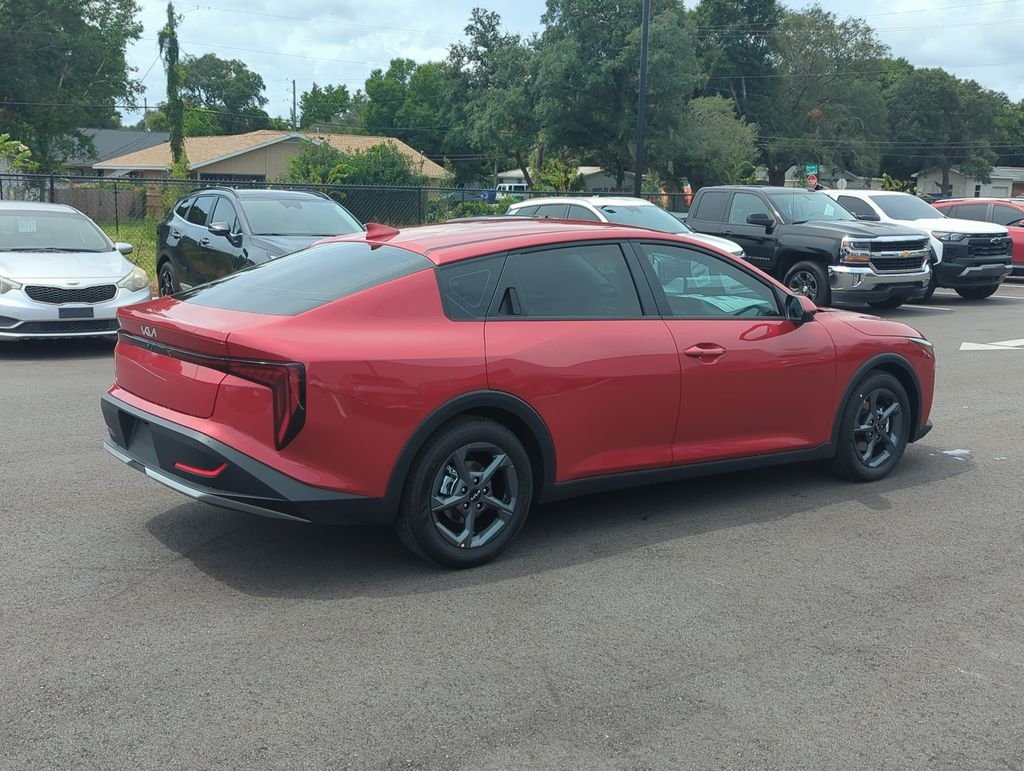 New 2026 Currant Red Kia LXS image 7