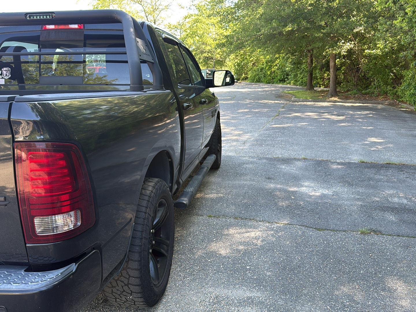 Used 2015 Brilliant Black Crystal Pearl Ram Sport image 11