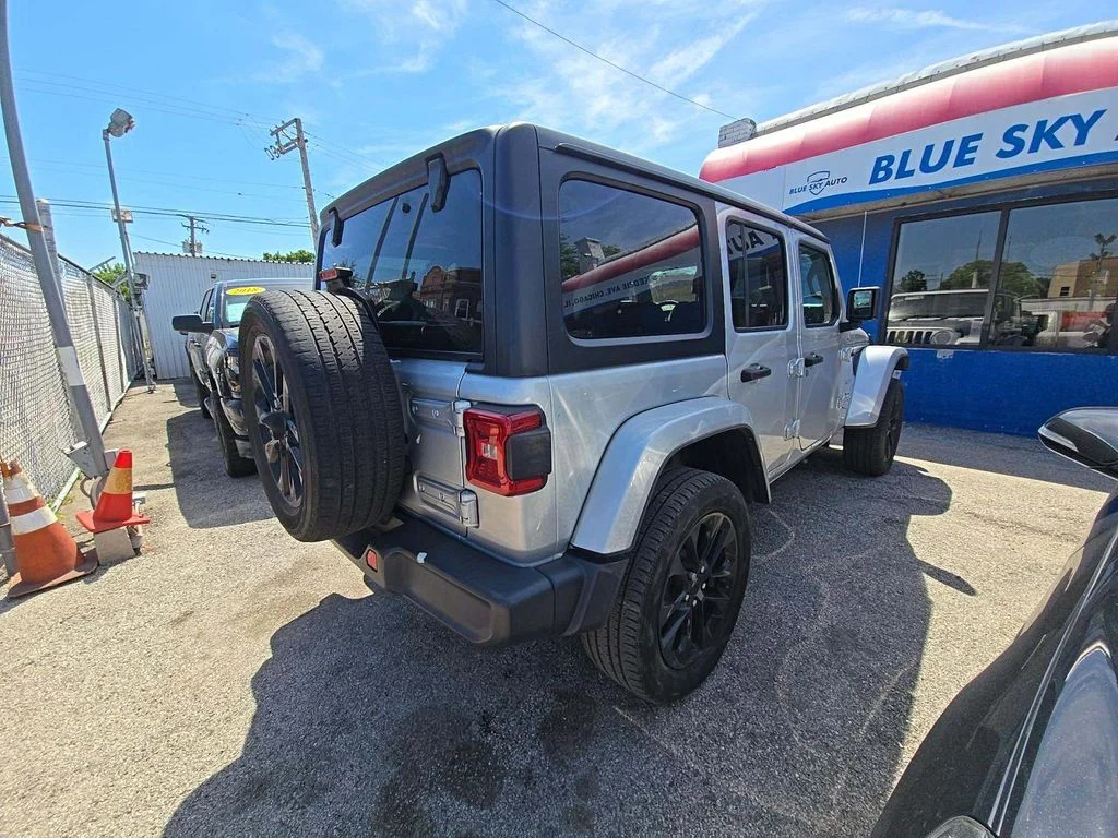 Used 2023 Silver Jeep Sahara 4xe image 2