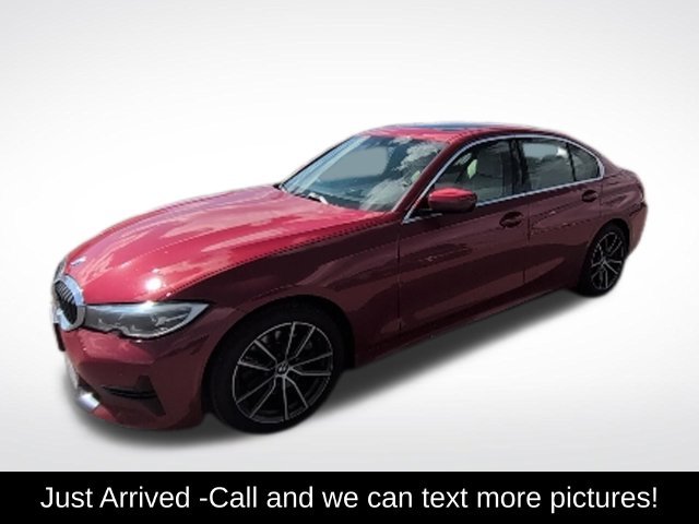 Used 2021 Melbourne Red Metallic BMW 330i xDrive image 1