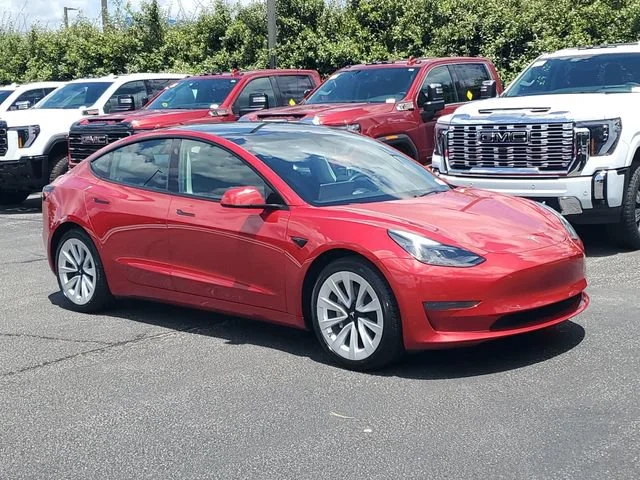 Used 2023 Red Tesla 4DR RWD image 1