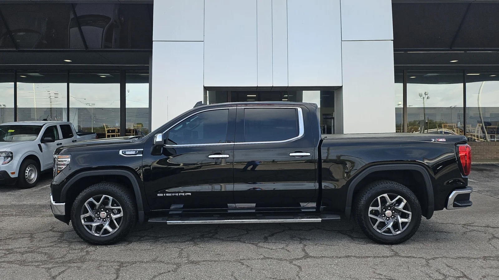 Used 2024 Black GMC SLT image 2