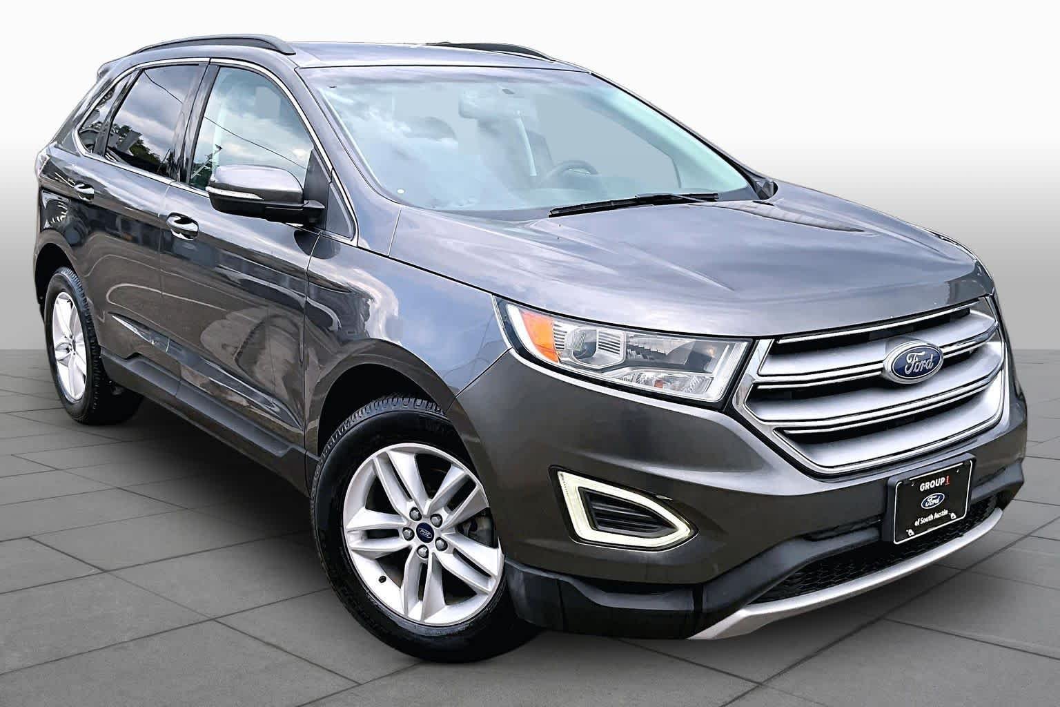 Used 2015 Magnetic Metallic Ford SEL image 5