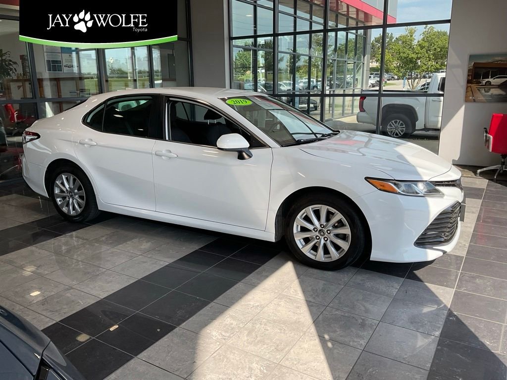 Used 2019 White Toyota LE image 1