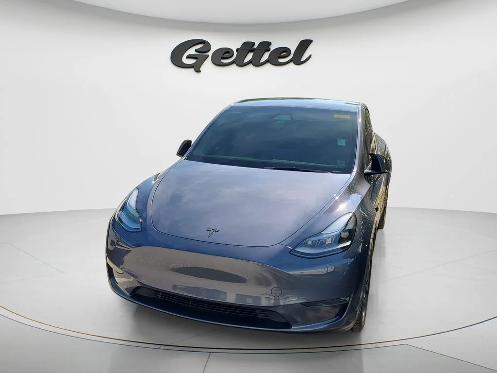 Used 2023 Tesla Model Y Long Range with VIN 7SAYGDEE1PA169837 for sale in Sarasota, FL