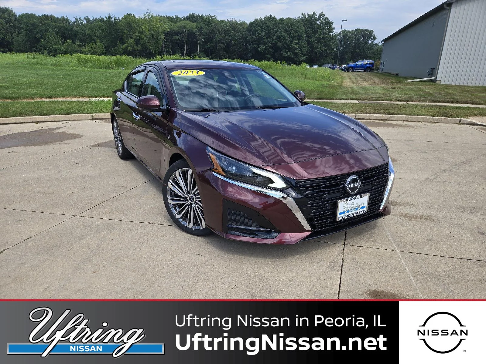 Used 2023 Garnet Pearl Metallic Nissan 2.5 SL image 1