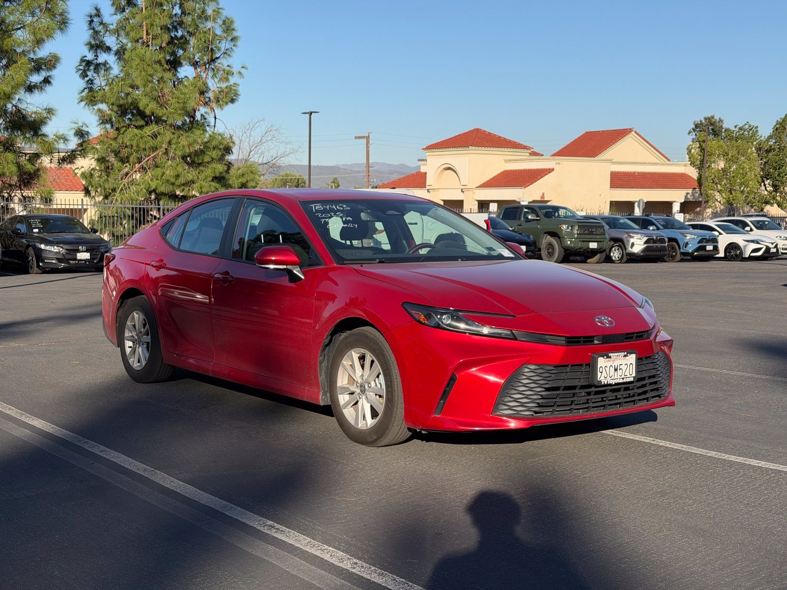 Certified Used 2025 Red Toyota LE image 2