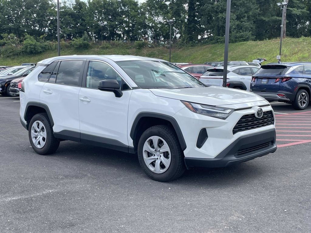 Used 2024 White Toyota LE image 1