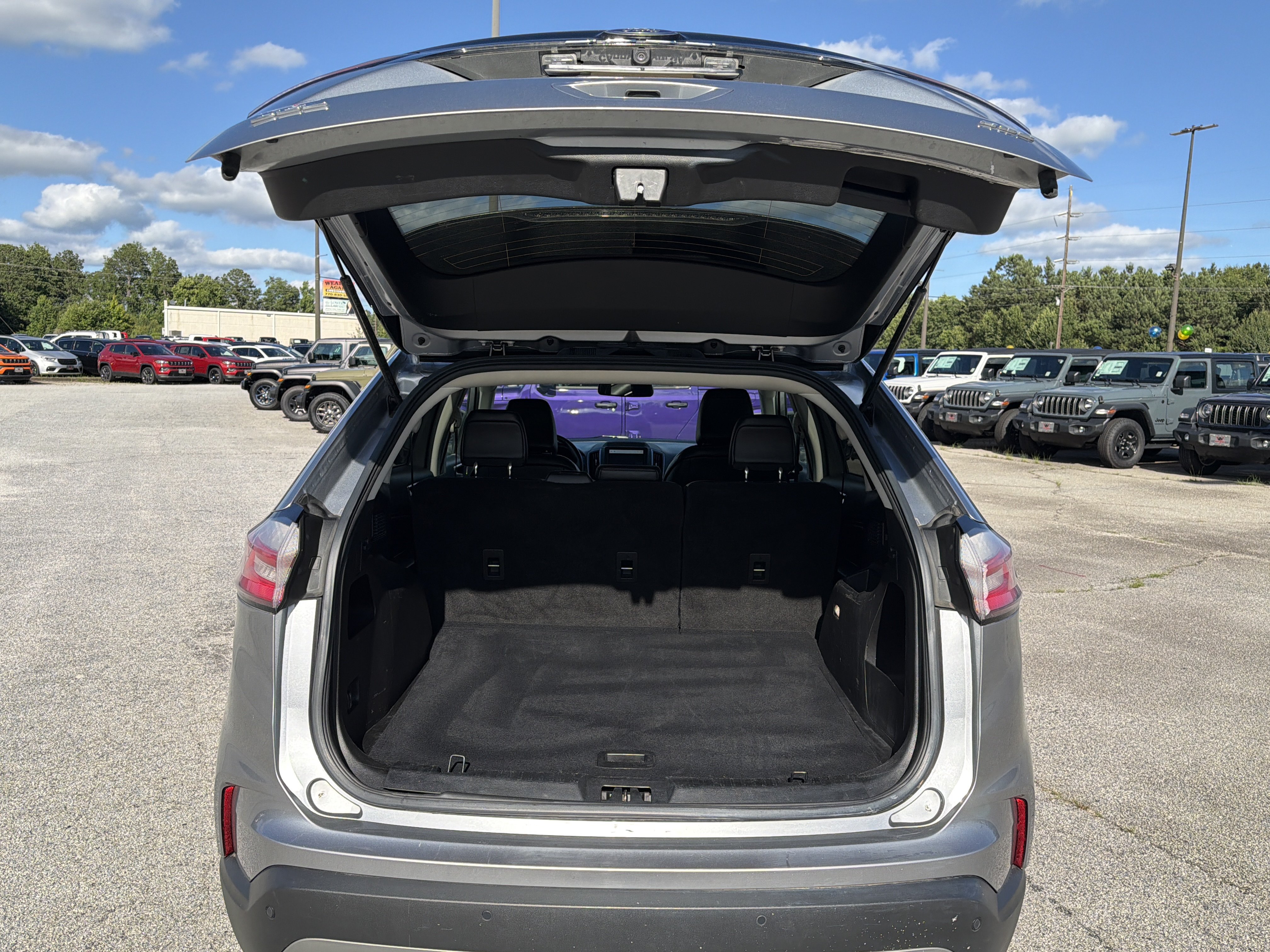 Used 2023 Silver Metallic Ford SEL image 19