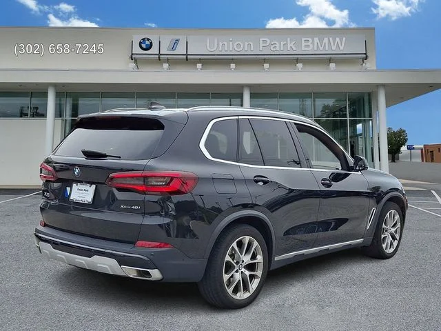 Certified Used 2023 Black Sapphire Metallic BMW xDrive40i image 4