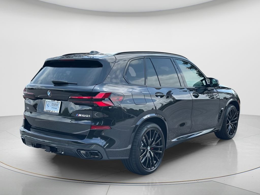 New 2026 Black Sapphire Metallic BMW M60i image 5
