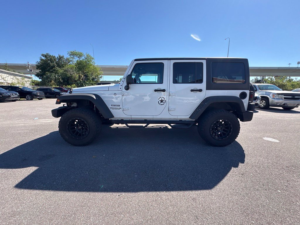 Used 2016 White Jeep Unlimited Sport image 6