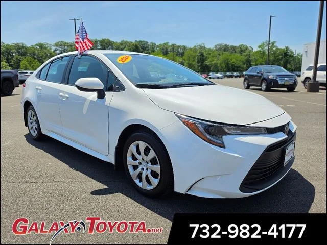 Used 2024 White Toyota LE image 1