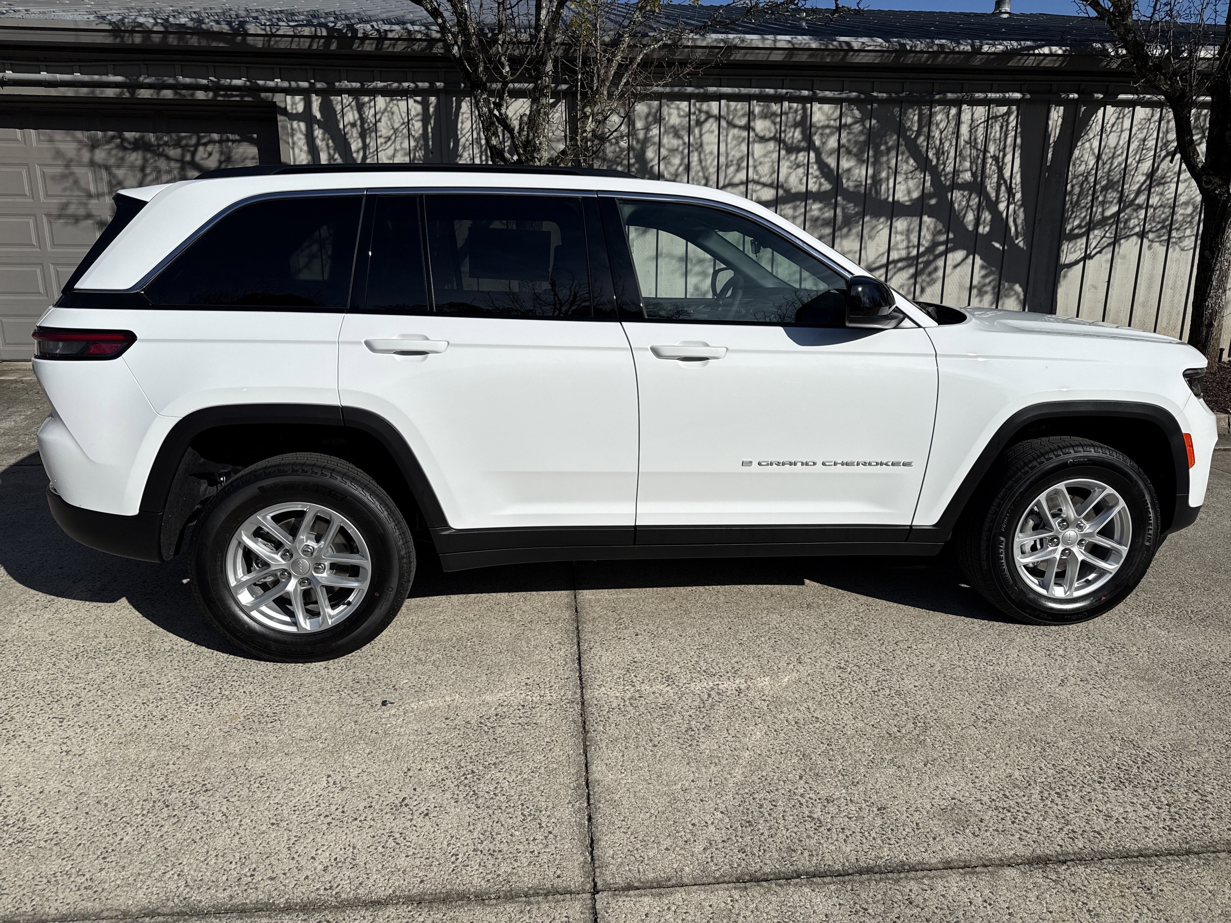 New 2025 Bright White Clearcoat Jeep Laredo image 8