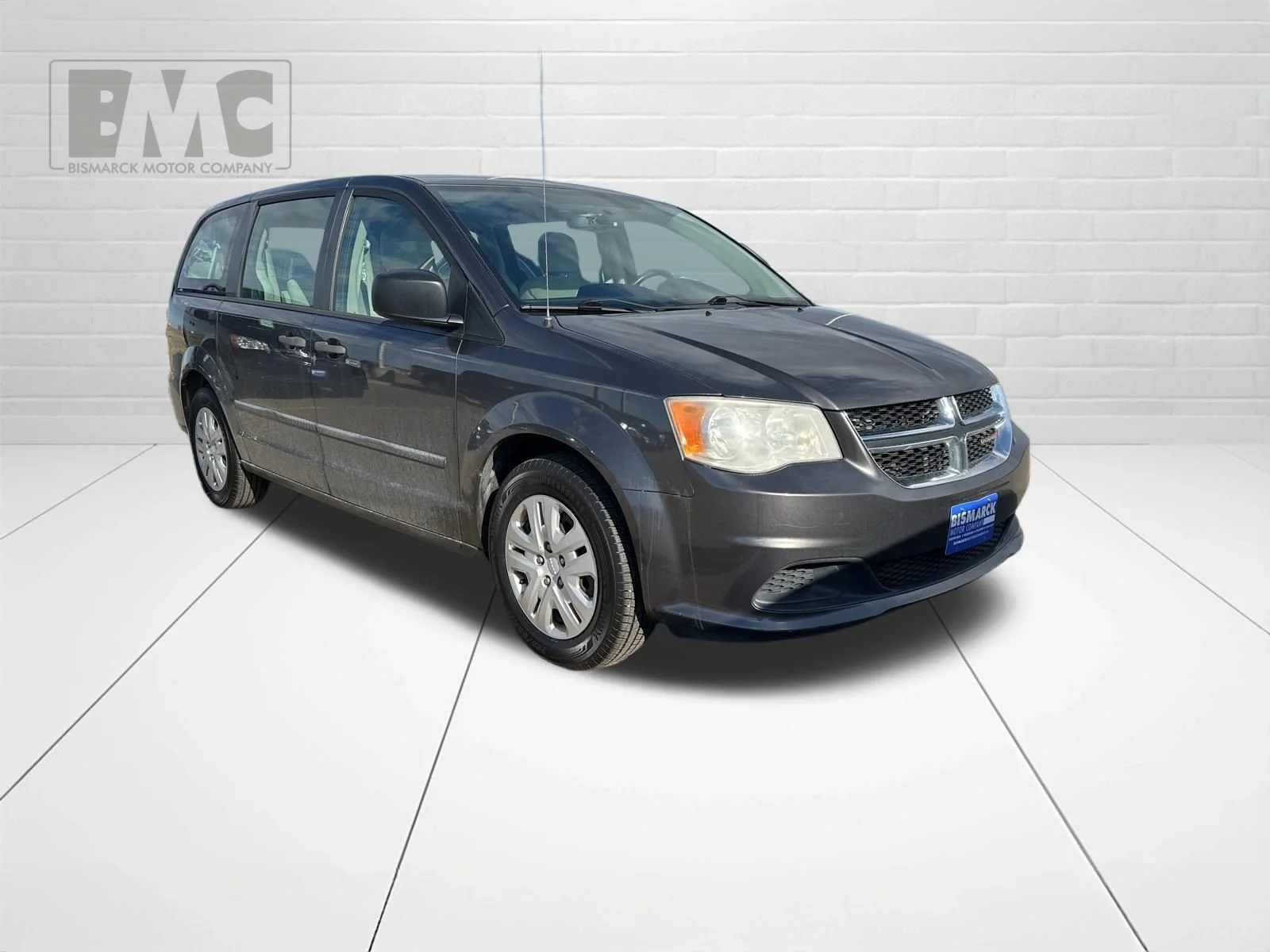 Used 2015 Dodge Grand Caravan American Value Package with VIN 2C4RDGBG1FR516977 for sale in Mandan, ND