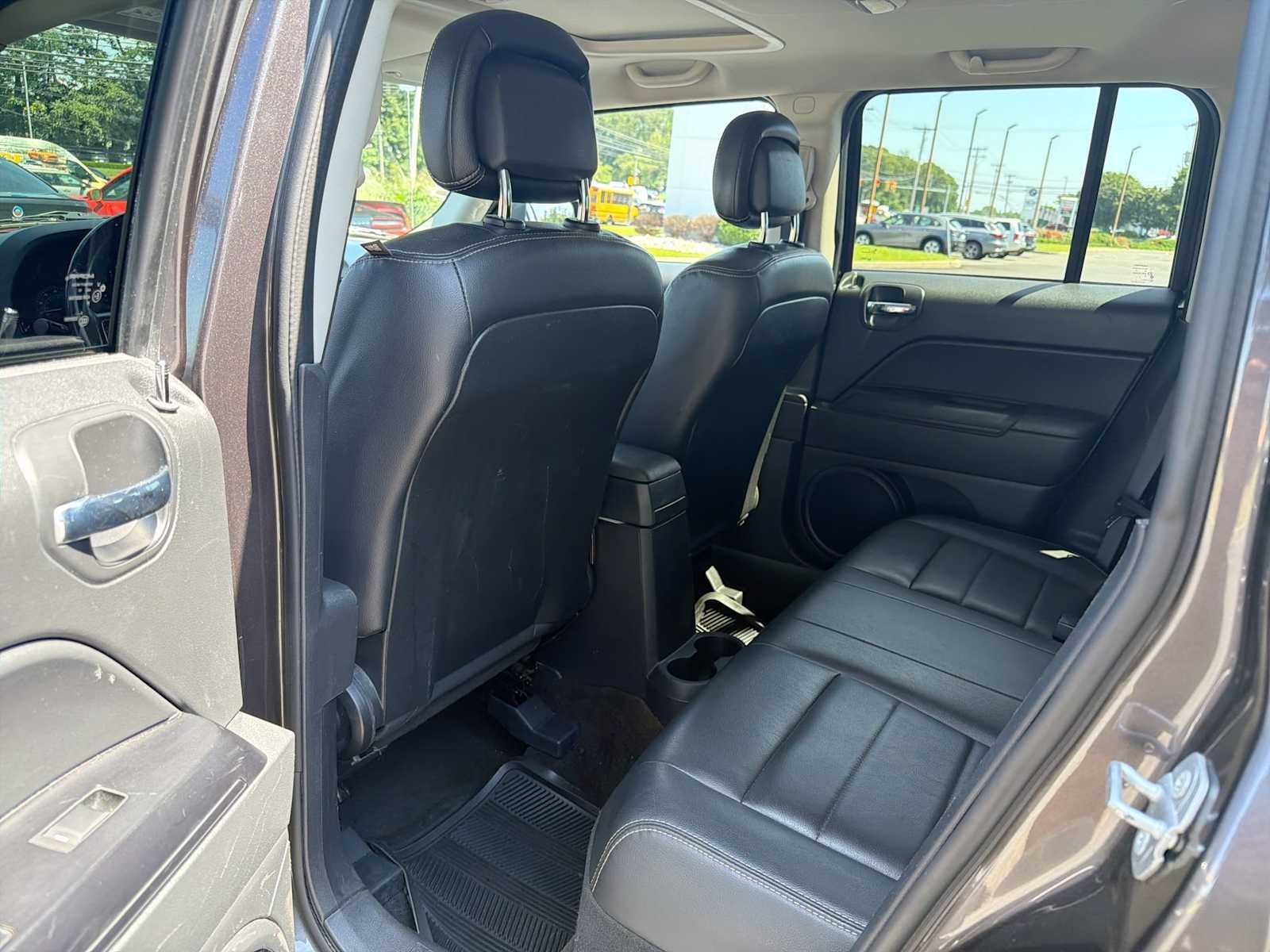 Used 2016 Granite Crystal Metallic Clearcoat Jeep High Altitude Edition image 12