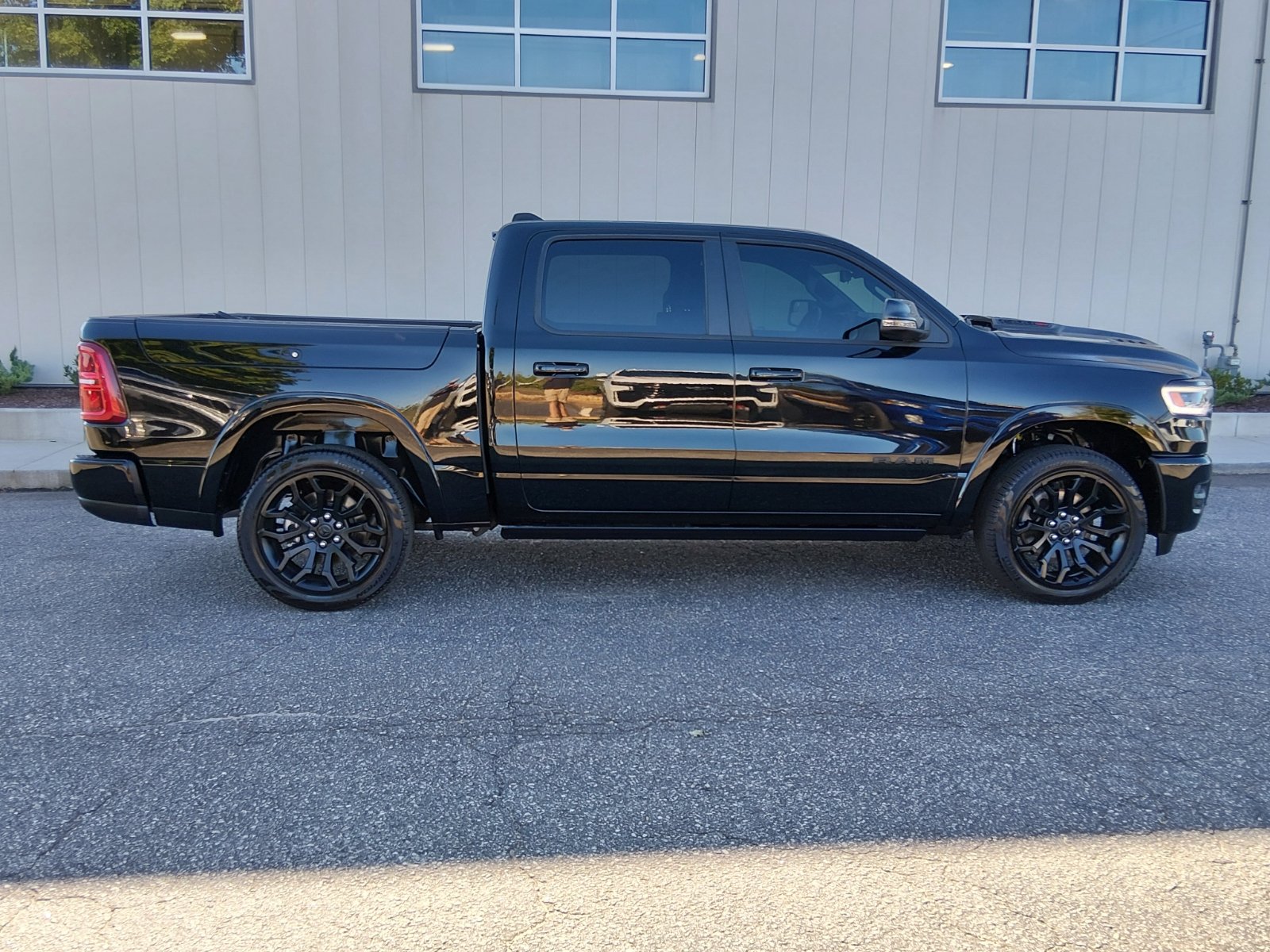 Certified Used 2025 Diamond Black Crystal Pearl Coat Ram Limited image 2