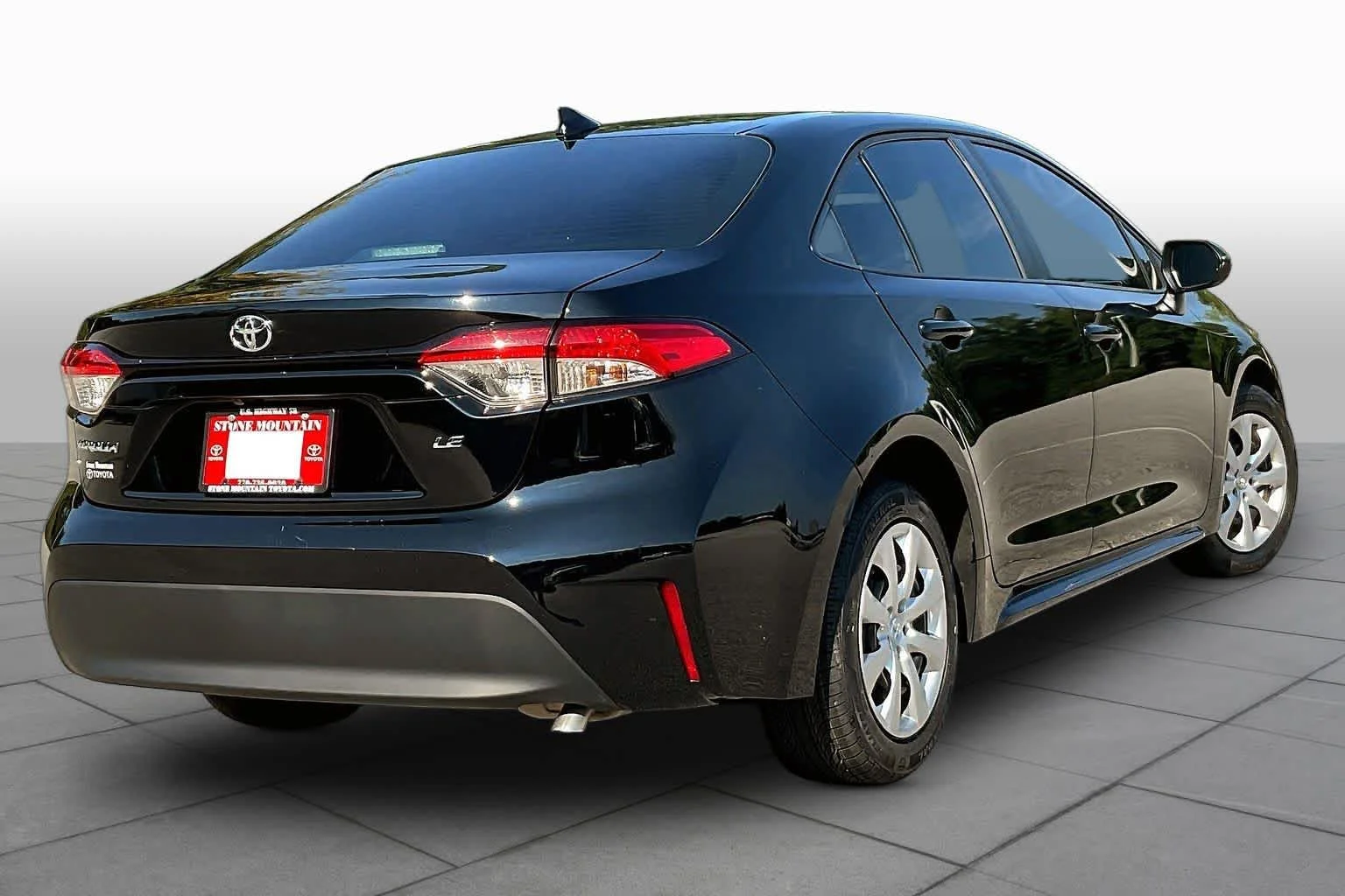 Used 2024 Midnight Black Metallic Toyota LE image 13