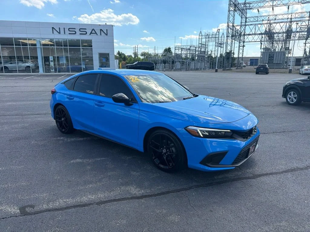 Used 2024 Boost Blue Pearl Honda Sport image 1