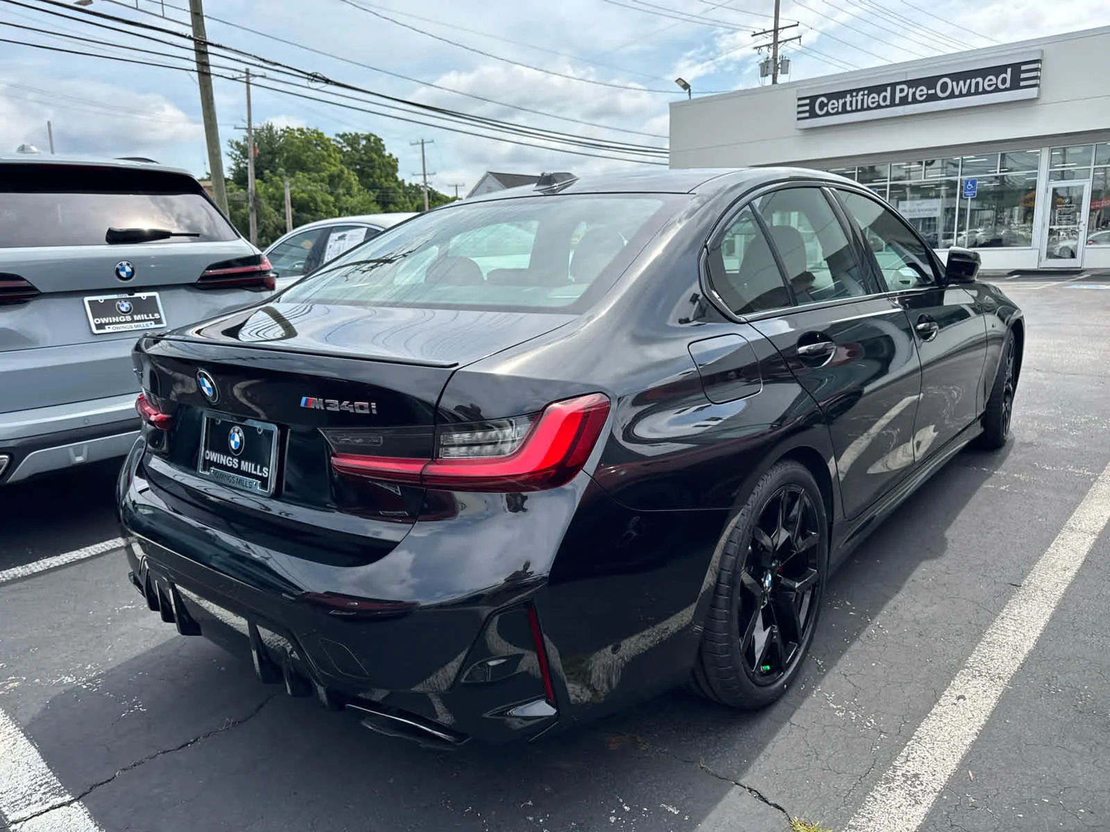 Used 2025 Black Sapphire Metallic BMW M340i xDrive image 12