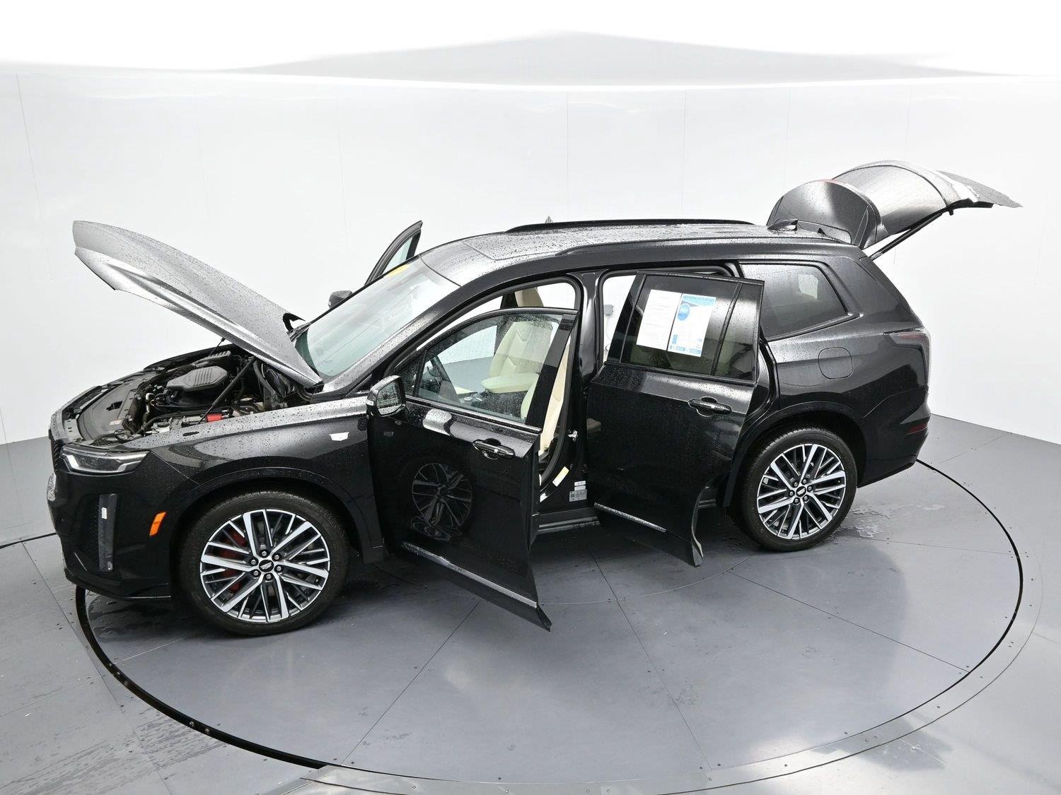 Used 2024 Stellar Black Metallic Cadillac Sport image 48