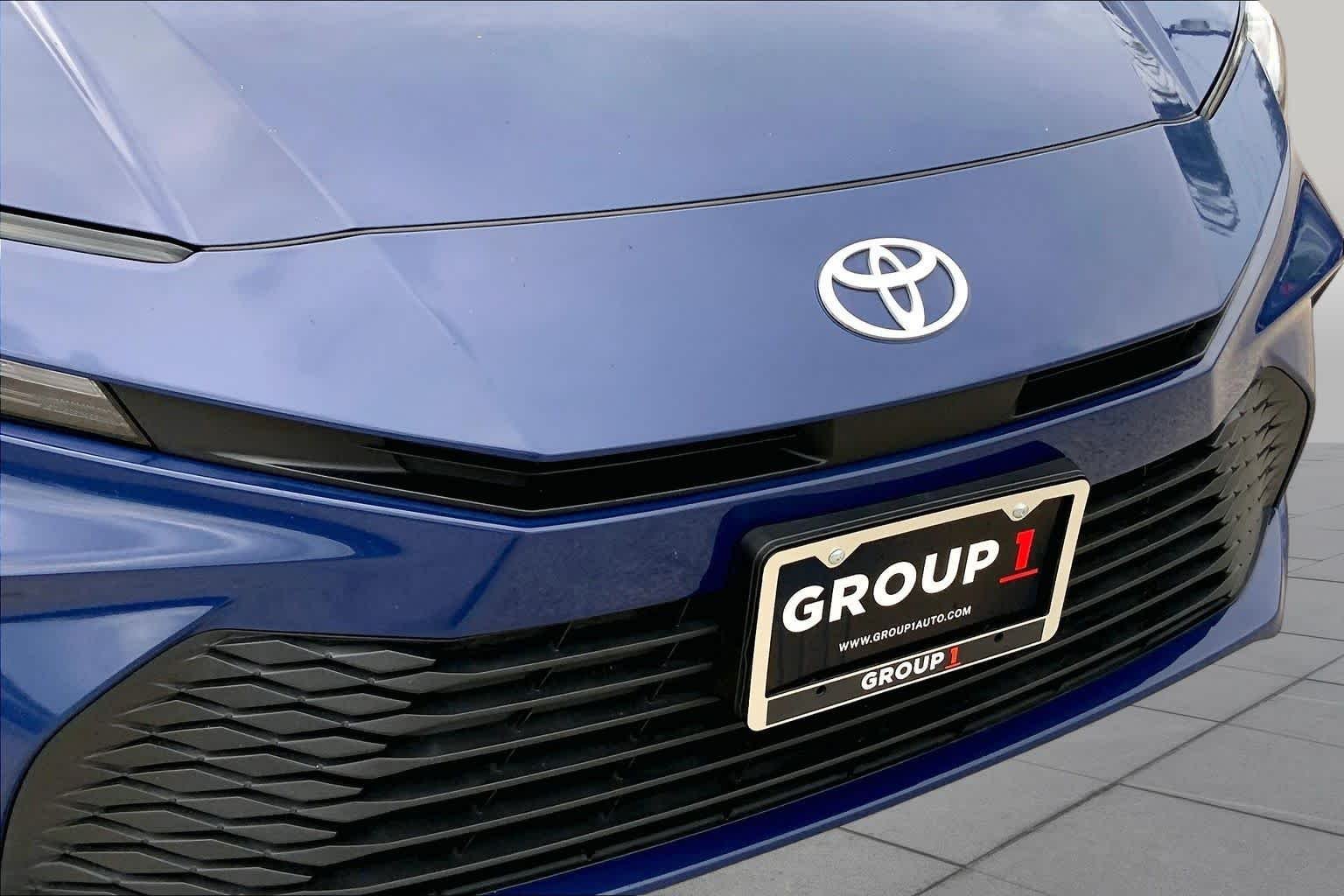 Used 2025 Reservoir Blue Toyota LE image 29