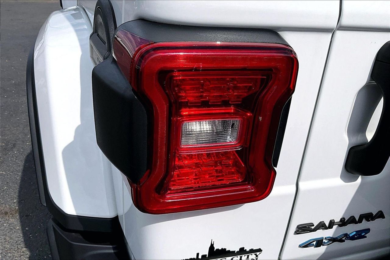 Used 2025 Bright White Clearcoat Jeep Sahara 4xe image 25
