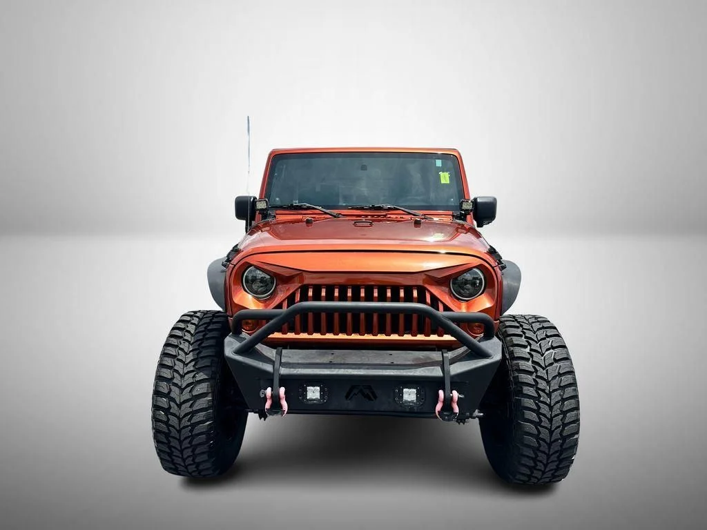 Used 2009 Orange Jeep Unlimited X image 7