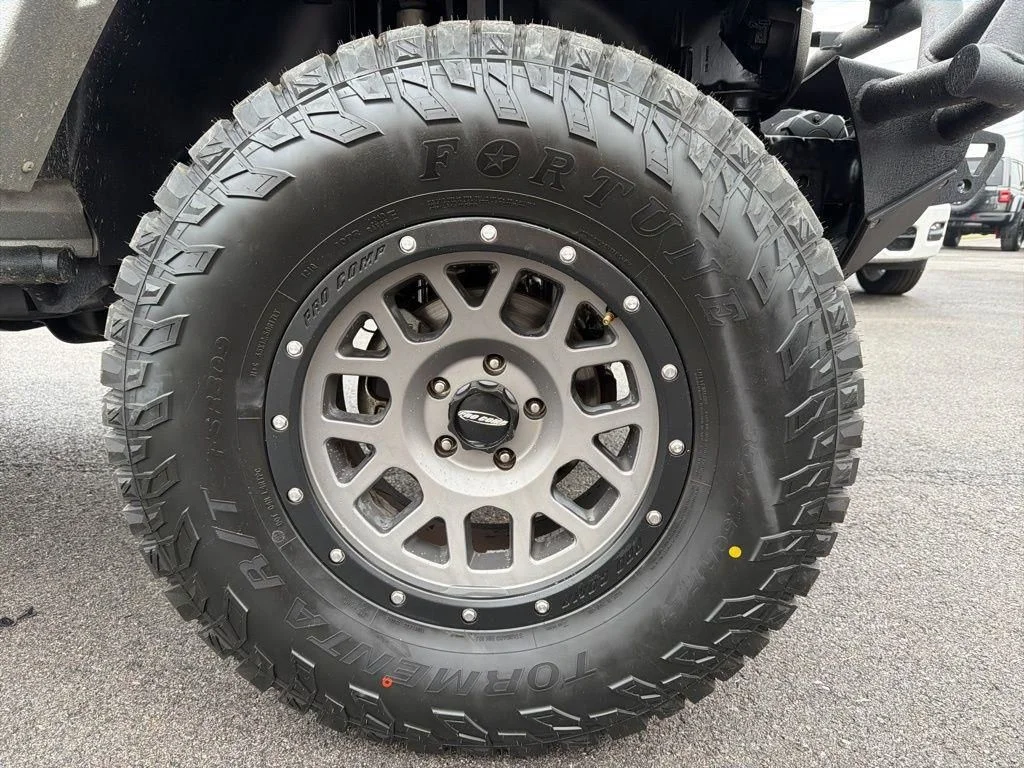 Used 2015 Silver Jeep Unlimited Sport image 12