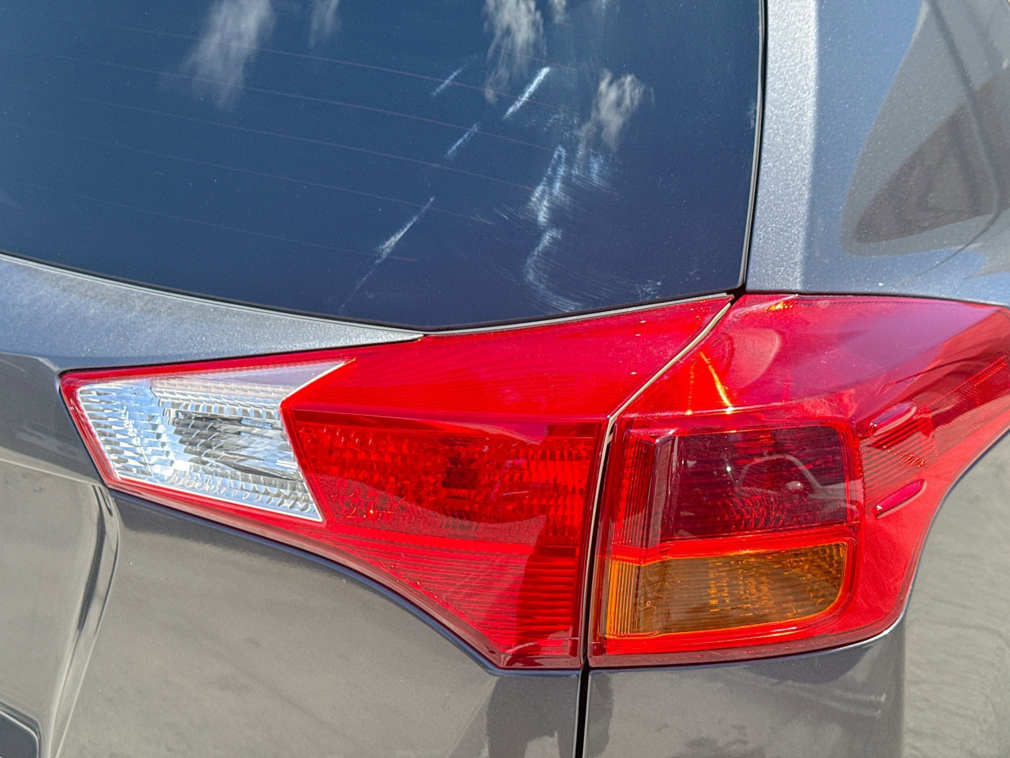 Used 2015 Magnetic Gray Metallic Toyota LE image 26