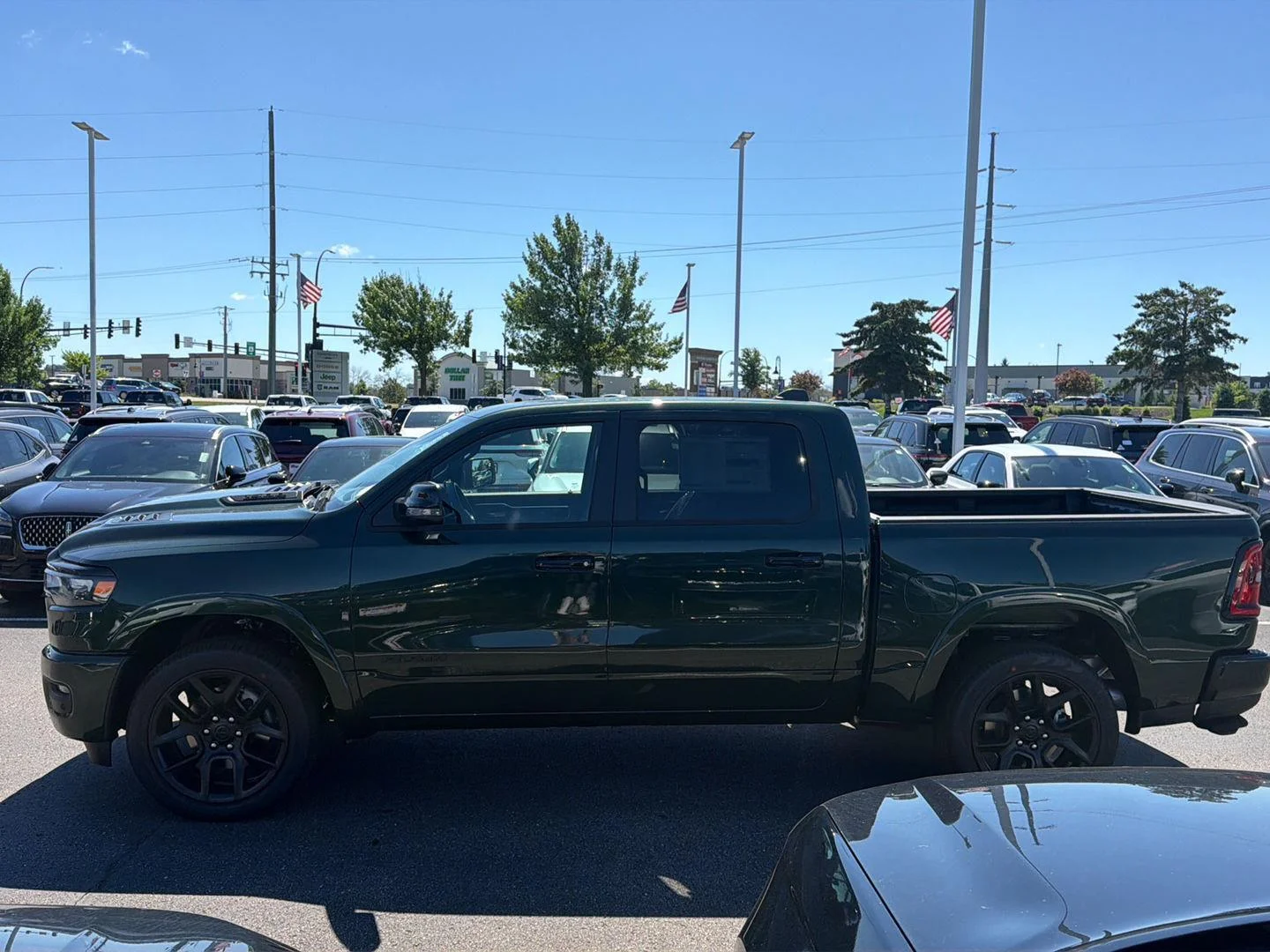 New 2026 Serrano-Green Metallic Exterior Paint RAM Laramie image 4