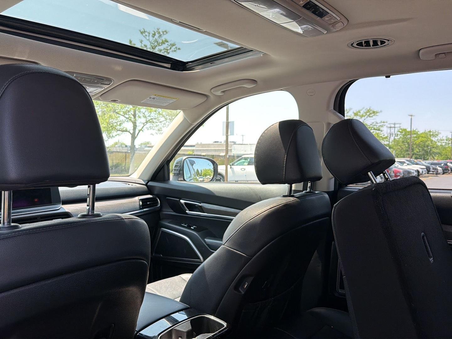 Used 2022 Ebony Black Kia EX image 9