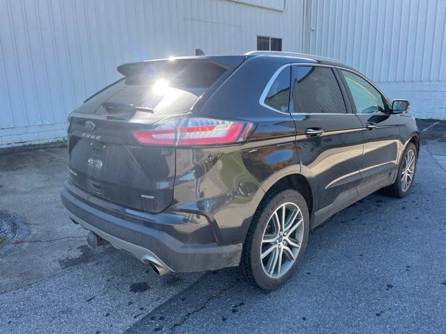 Used 2022 Black Ford Titanium image 4