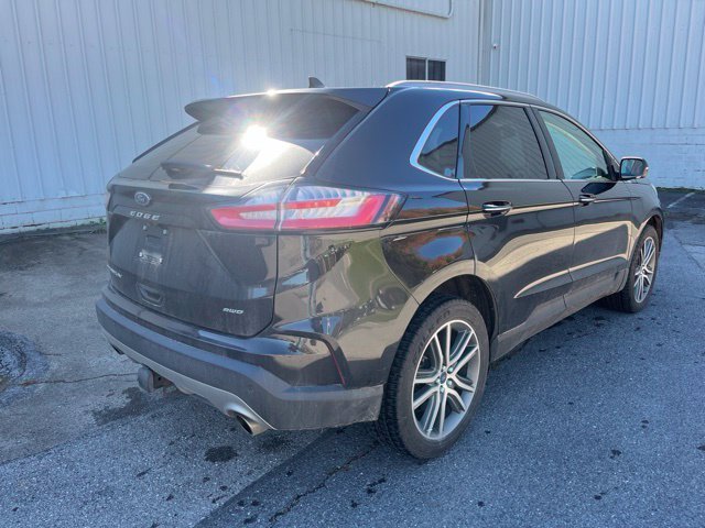 Used 2022 Black Ford Titanium image 4