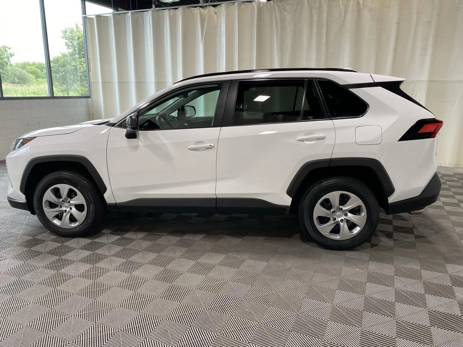 Used 2021 Super White Toyota LE image 4