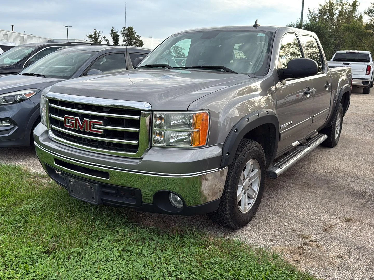 Used 2012 Steel Gray Metallic GMC SLE image 1