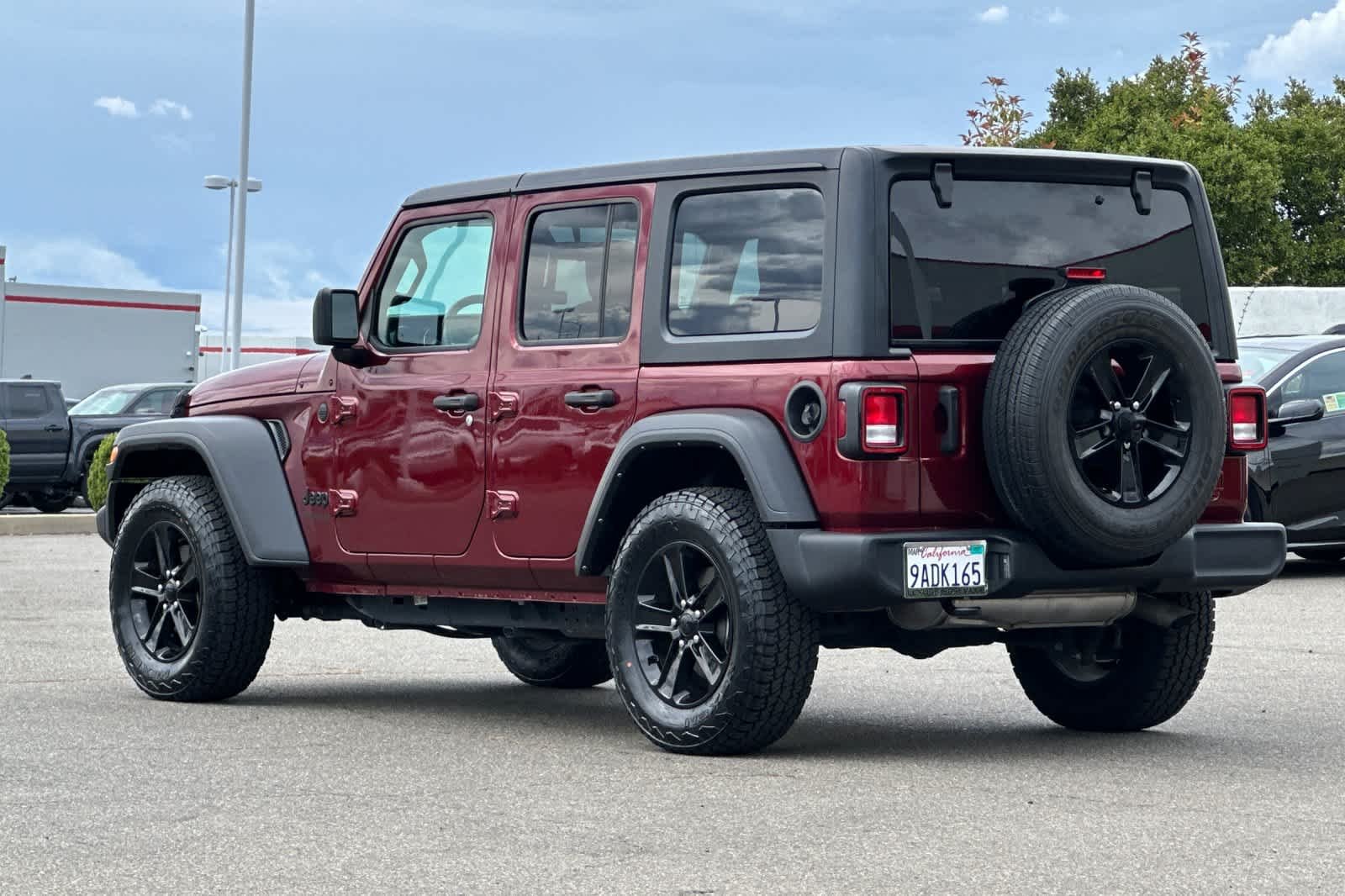 Used 2022 Snazzberry Pearlcoat Jeep Unlimited Sport Altitude image 7