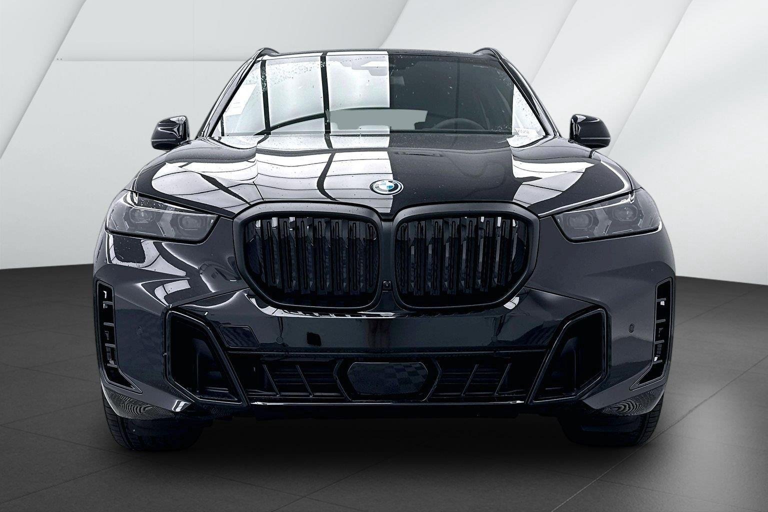 New 2026 Black Sapphire Metallic BMW xDrive50e image 2