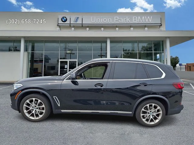 Certified Used 2023 Black Sapphire Metallic BMW xDrive40i image 7